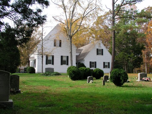 Slash Church from back of building showing grayeyard